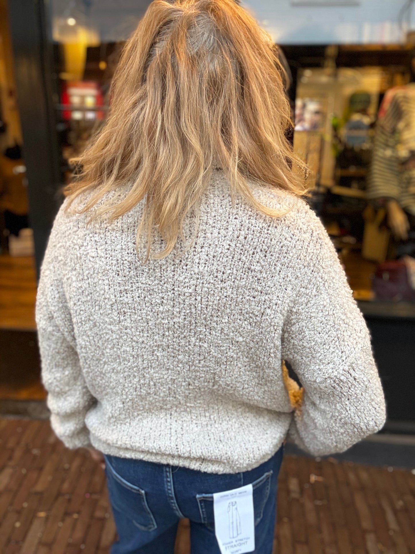 Bouclé Trui met Col