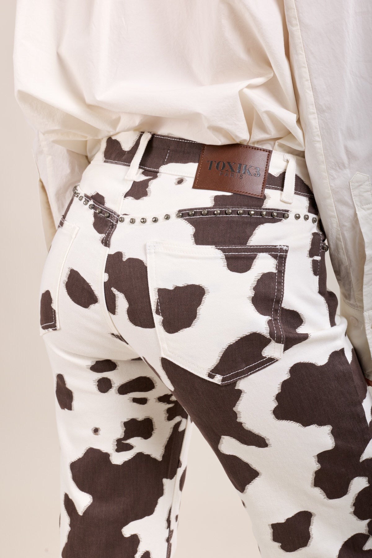 Toxik koeien print met studs