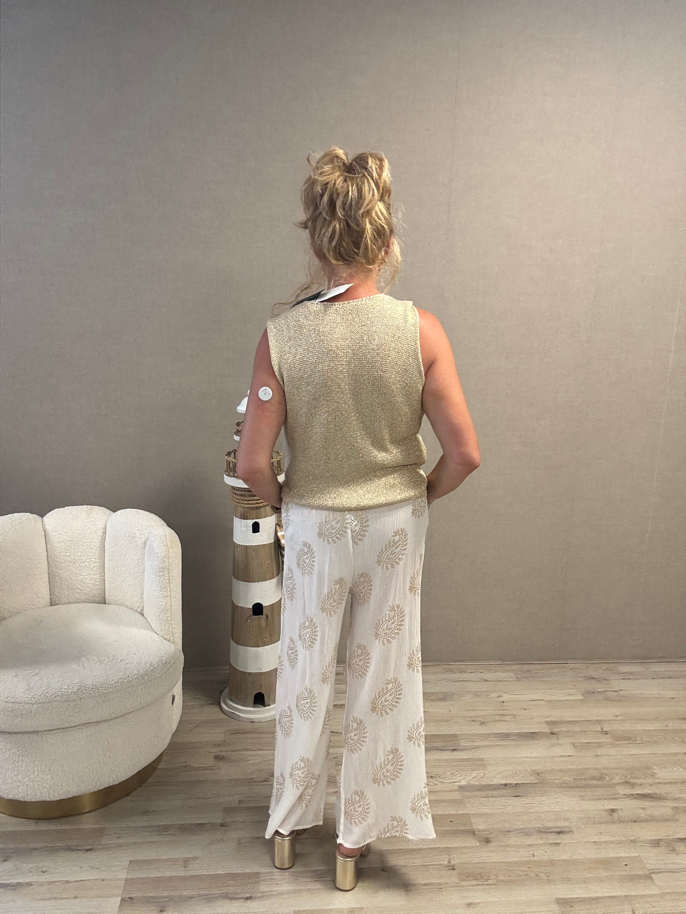 Lurex spencer met gouden knopen