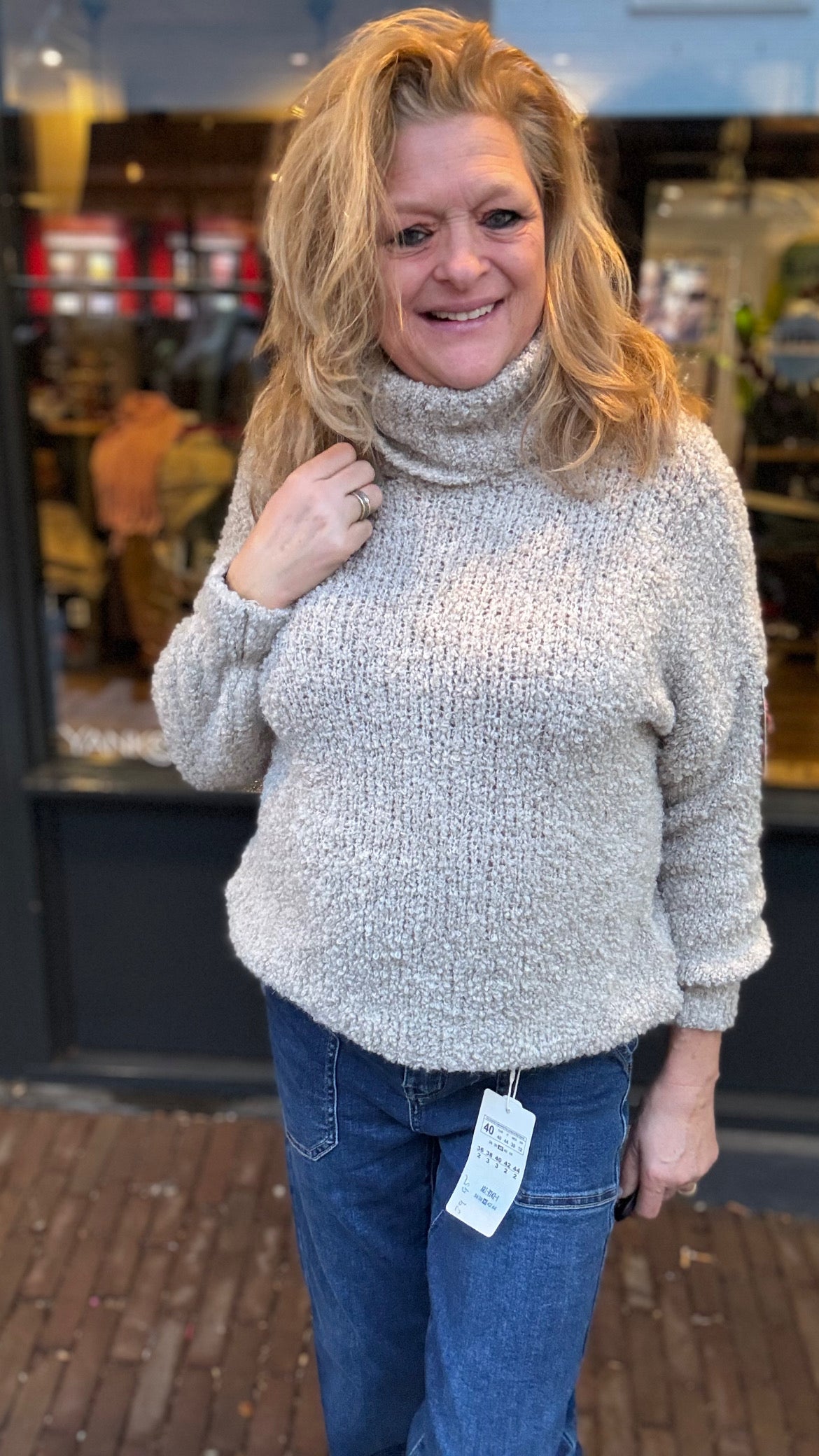 Bouclé Trui met Col