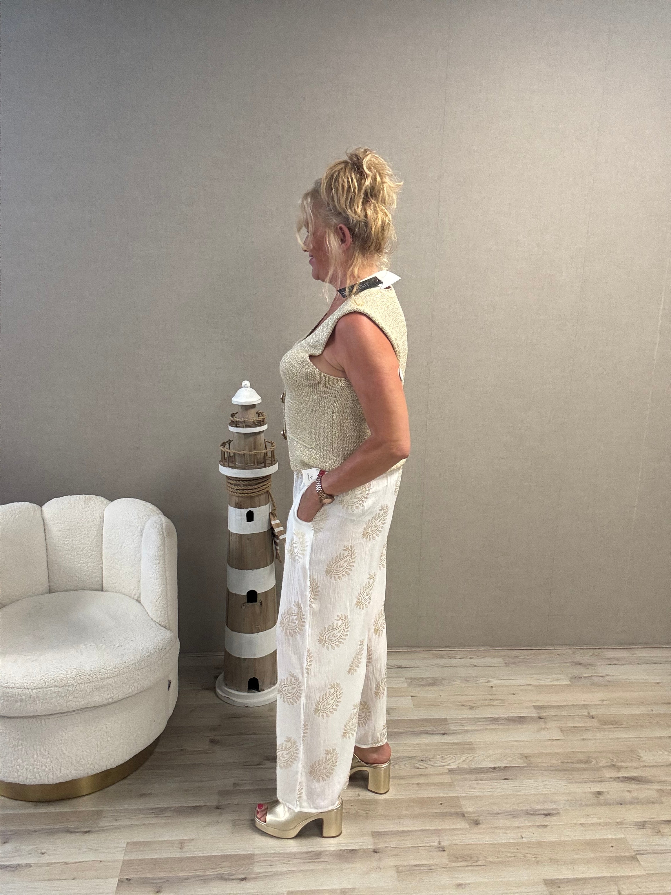 Lurex spencer met gouden knopen